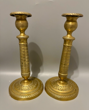 Paire de bougeoirs d’époque Restauration